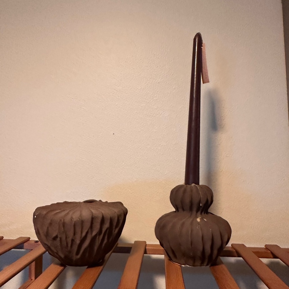 Candle holder and small vase.